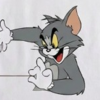 تام